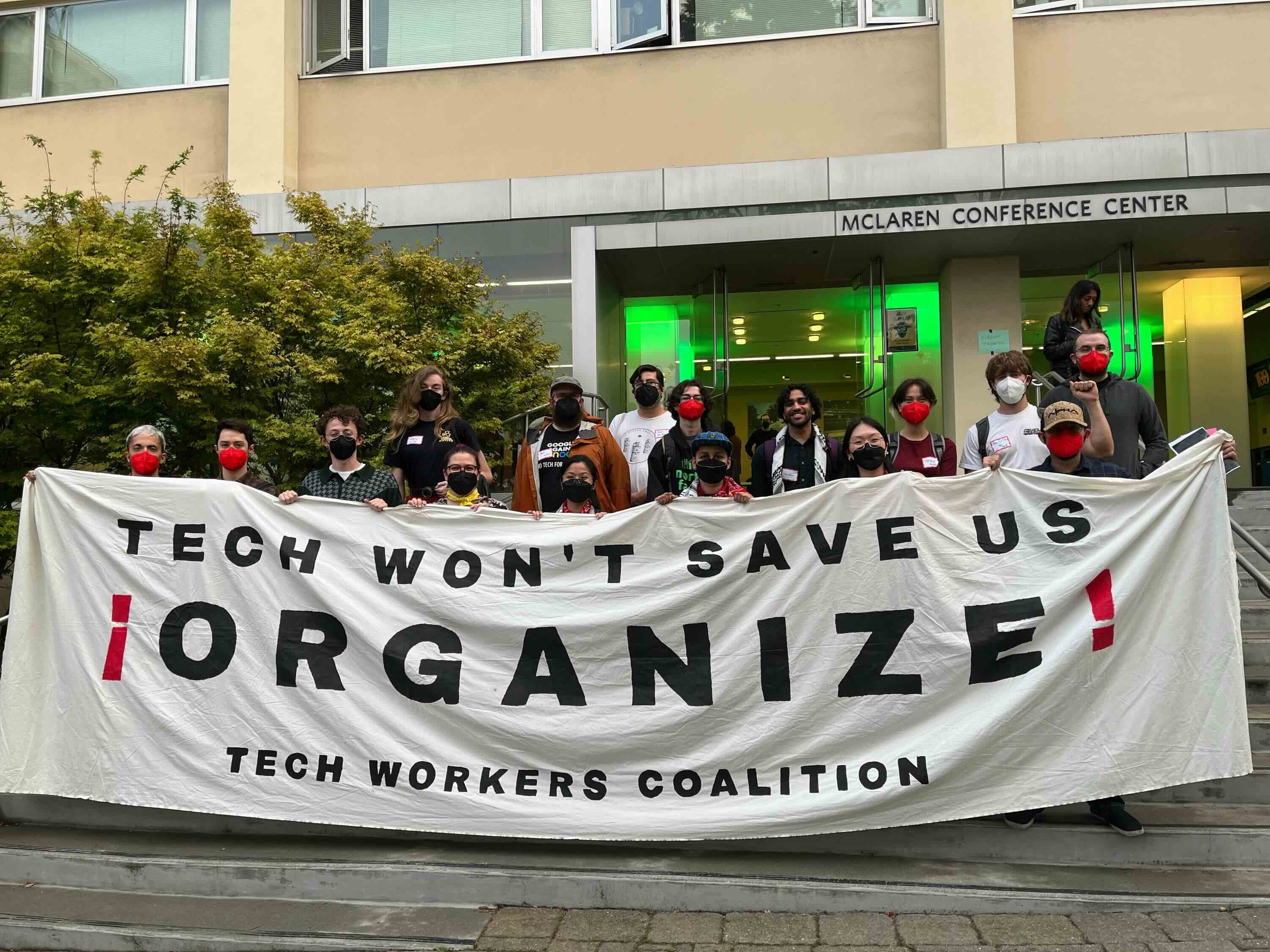 Group photo from 2024 Circuit Breakers Conference with banner: Tech Won't Save Us: Organize!
